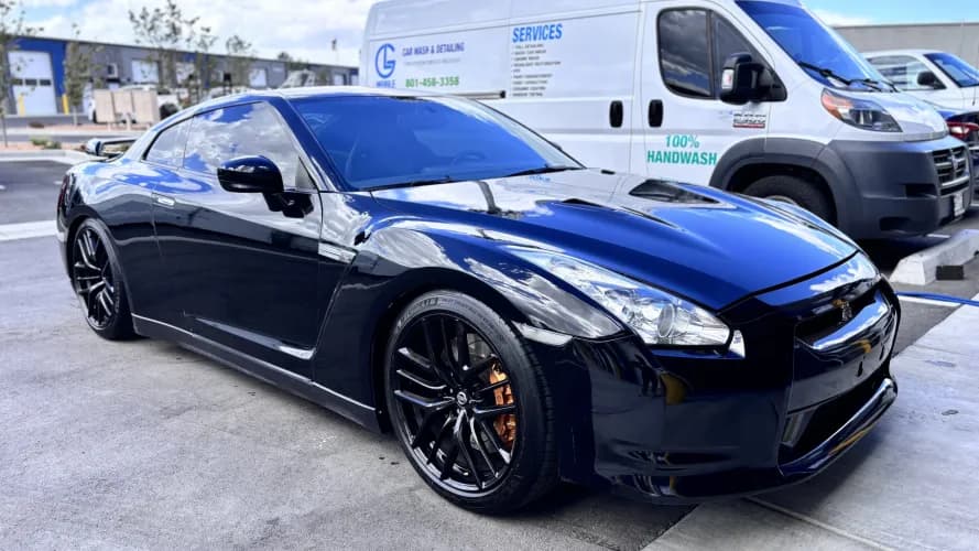 Glossy black Nissan GT-R after paint care
