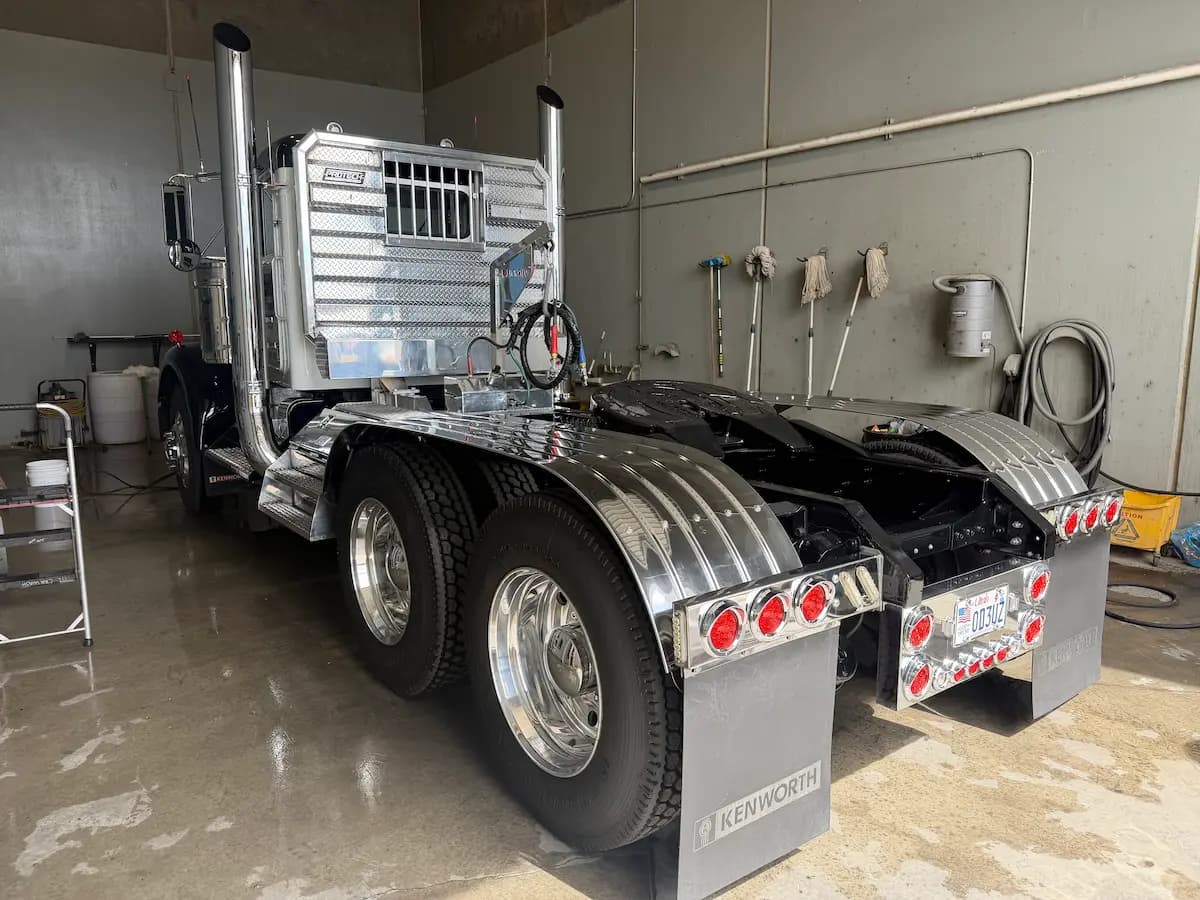Detailed Kenworth semi truck with polished chrome fenders